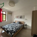 Comfortable bedroom with modern furniture, available in 1 bedroom apartment at 21 Kogalniceanu Boulevard, 2nd floor, Bucharest.