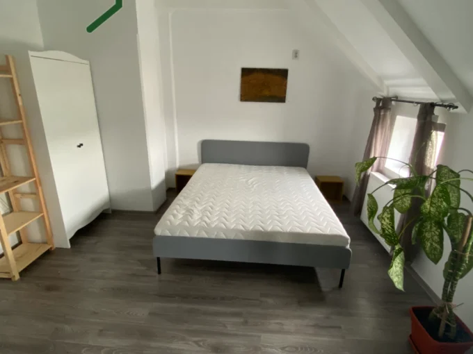 Comfortable bedroom with modern furniture, available in 1 bedroom apartment